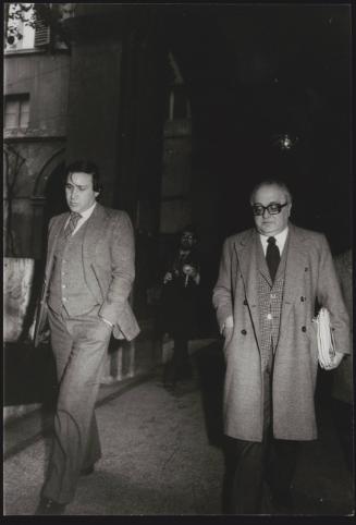 PCI politicians Claudio Signorile and Gerardo Chiaromonte leaving government meetings at the headquarters of the Christian Democratic Party, where the economy was discussed by the 6 parties