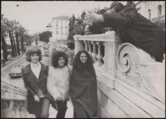 The singers Marcella Bella, Angelica and Delia Gualtiero are greeted by photographers. They performed at the San remo Music festival in 1972