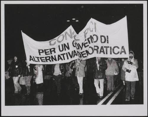 Protesters march a Communist Party demonstration