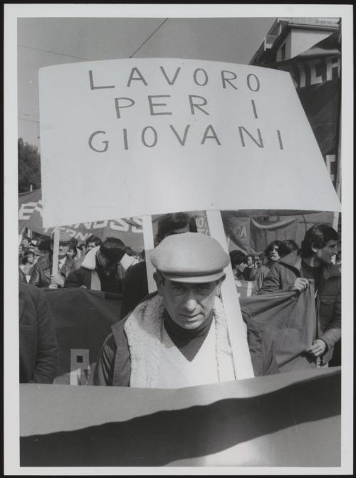General Strike 1982. A man holds a placard at workers demonstration demanding jobs for the young