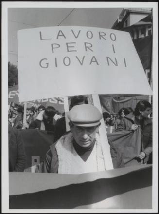 General Strike 1982. A man holds a placard at workers demonstration demanding jobs for the young