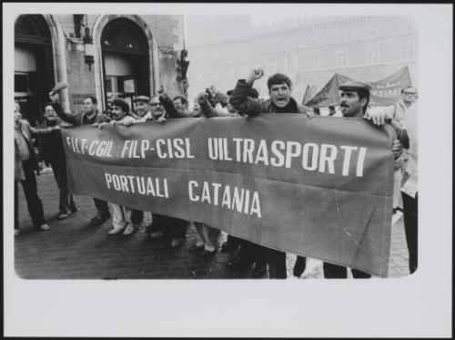 A demonstration by Sicilian transport workers in the city of Catania, on Sicily's east coast. FILT-CGIL and FILP-CISL are port workers' unions, under the Italian Federation of Transport Workers.