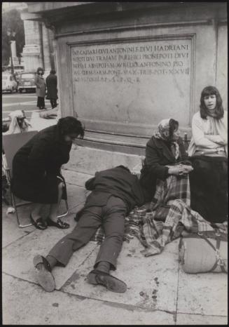 A group of homeless people after being evicted from their homes