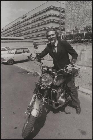 Actor Federico Martignoni about to collect club owner Paolo Vassallo on a motorbike during the Number One night club drugs scandal

