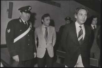 Three of the defendants from the scandalous "Number One" night club drugs trial, Beppe Ercole leading at the right and Bruno Ruggeri behind him