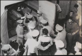 Maria Pia Vianale (wearing sunglasses and followed by Franca Maria Salerno) of the left wing terrorist organisation Armed Proletarian Nuclei (NAP) in the back of a police van following her capture