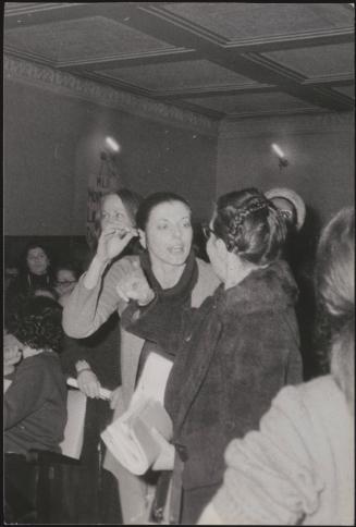 Members gather for a meeting of the M.L.D- Movement for the Liberation of Women