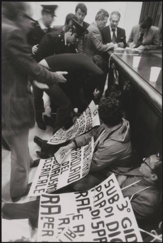 Members of the Radical Party with placards at RAI TV studio headquarters.