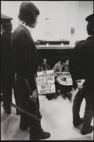 Members of the Radical Party with placards at RAI TV studio headquarters