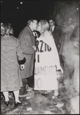 A couple kiss among proponents of the Italian divorce law demonstrating for its adoption in parliament