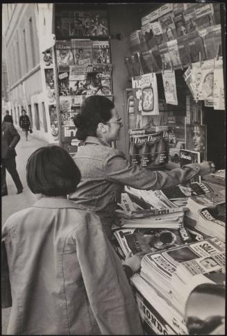 The former Prison vice-director who was married to murderer Marino Vulcano photographed buying a magazine