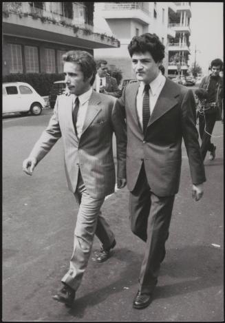 Plane-jacker Rahael Minichiello looking confident walking through Rome with one of his Italian lawyers, Edmondo Zappacosta