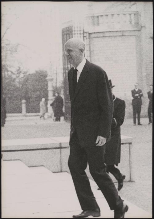 A minister arriving to meet British Prime Minister Harold Macmillan