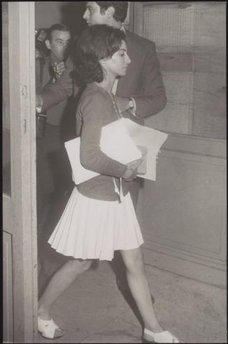 Silvana Giacobini, writer and journalist carrying documents from the Prosecutor's office in Rome