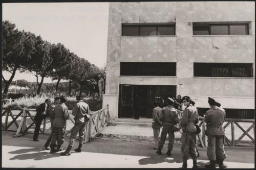 Armed guards stand outside the building for the Golpe Borghese trial 
