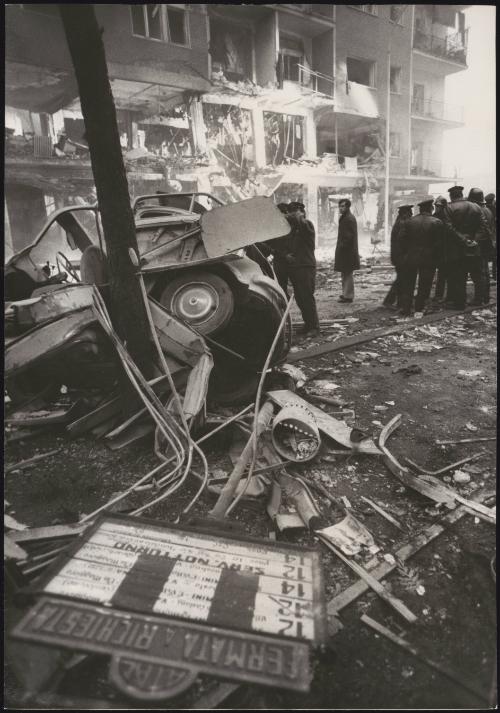 Twisted metal and burnt out cars after an explosion