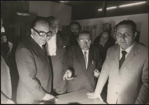 Christian Democrat politicians, including Amerigo Petrucci (left) standing around a table
