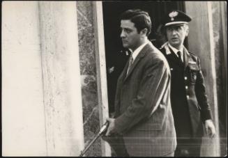 Plain clothes police bodyguards