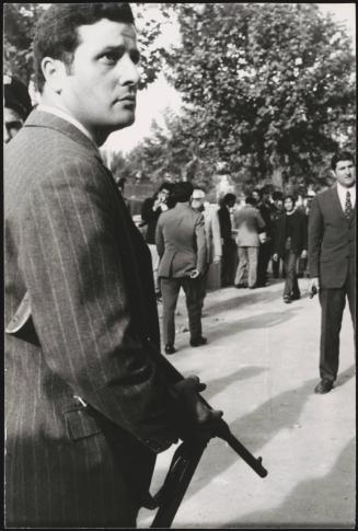 Plain clothes police bodyguards