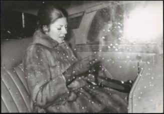 Princess Soraya photographed through her chauffeur car's window