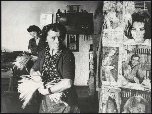 Women making brushes from straw. 