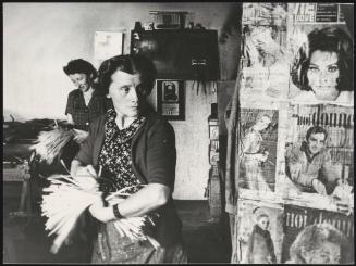 Women making brushes from straw. 