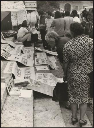 Protest posters laid out on steps
