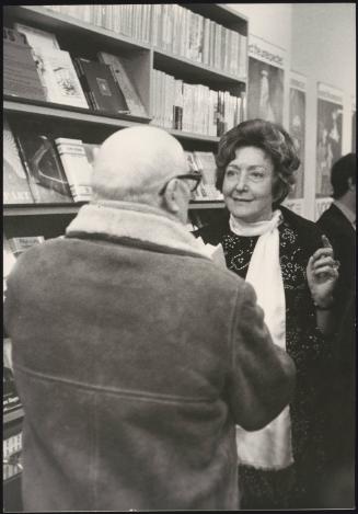 Cesare Zavattini in a gallery bookshop with Maglietta author of 'Gallerite'