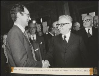 President of the Republic Giovanni Leone shakes Italo Calvino's hand as he presents him with the prestigious Feltrinello prize
