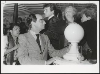 Journalist and writer Italo Calvino with a trophy 
