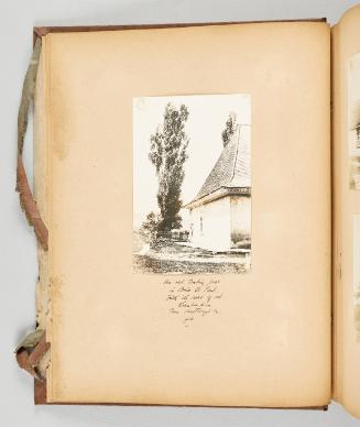 An old trading post in Baie St. Paul, with its row of red Lombardies, was destroyed by fire. [Page 8 of Quebec I; from collection of Canadian albums compiled by Edith S. Watson, 1890s-1930s]