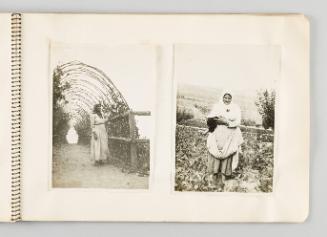 [Woman standing under viney trellis; Woman nursing baby] [Page 49 of The Doukhobors I album]
