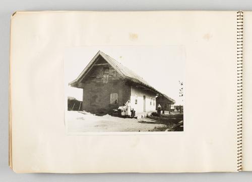[Building with women and children standing outside, page 44 of The Doukhobors I album]