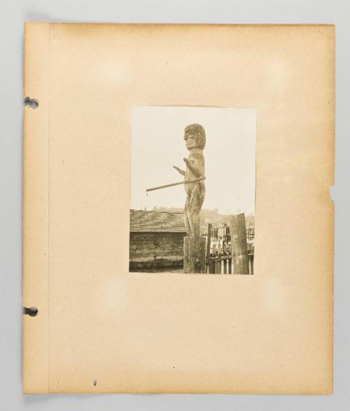 [Totem of man in Alert Bay, Page 15 of Alert Bay, Queen Charlotte Islands, and Victoria, B.C. album]