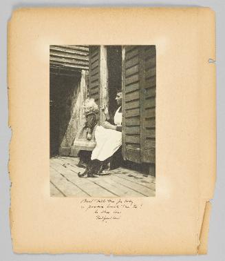Bread & milk time for baby is pussies lunch time too! In Shue Cove, Newfoundland [Page 4 of Children album]
