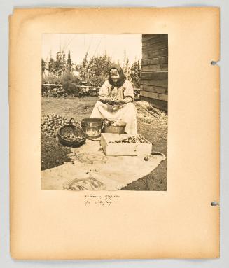 Slicing apples for drying. [Page 46 of The Doukhobors II album]