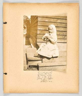 It is not only old fingers that hold the knitting needles. Look at this baby picking up a dropped stitch! Brilliant, B.C [Page 27 of The Doukhobors II album]