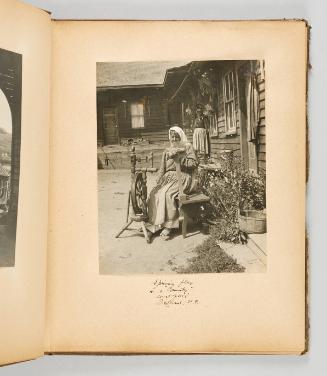 Spinning flax in a "Community" courtyard, Brilliant, B.C. [Page 3 of The Doukhobors II album]