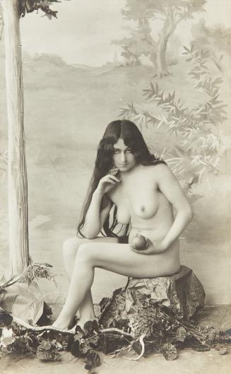 [Woman with long hair holding apple]