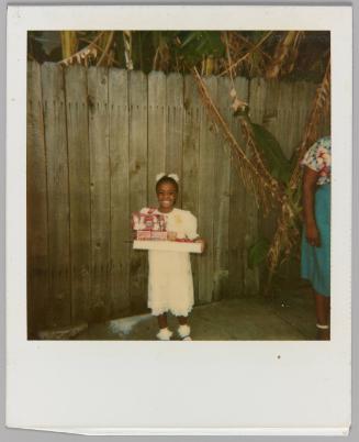 [Girl with white hair accessories holding presents]

