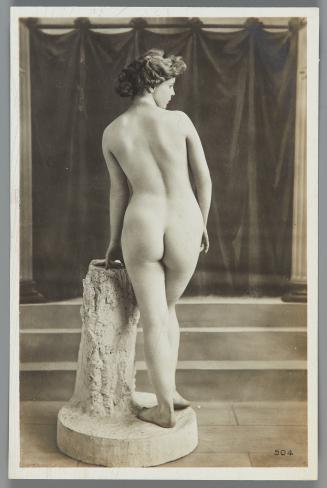 [Woman posed on plaster stand, back view]