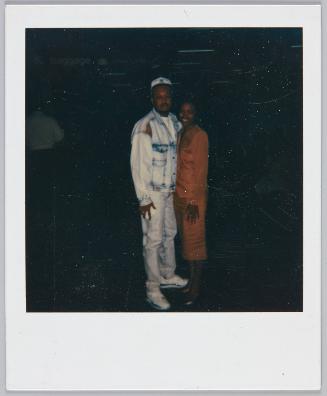 [Young couple, man on wears acid wash denim jacket and jeans]