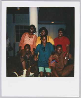 [Group of six posing, young woman on right wearing a pink crochet top]