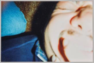 [Close-up of a mans face, scrunching up nose and eyes]
