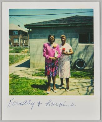 Dorothy & Loraine [Two older women posing on lawn]
