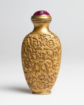 Snuff bottle in bronze with a floral design