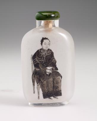 Snuff bottle in glass with a lady painted on the inside