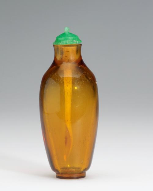 Snuff bottle in amber glass