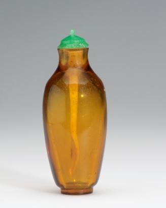 Snuff bottle in amber glass