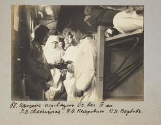 Process of bandaging in IV class car. L.V.Svetnitskaia,I.V Petrovich, P.I Verbov